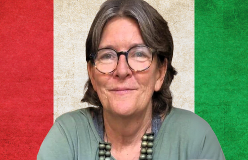 Cynthia Clough with Italian flag in background